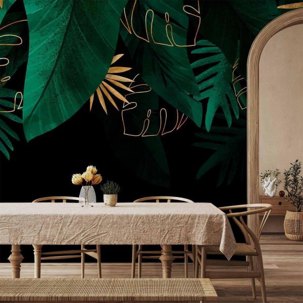 Papier peint - Jungle and composition - motif of green and golden leaves on a black background