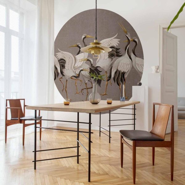 Papier Peint rond - Cranes dancing - bright silhouettes of birds on a warm grey background with texture