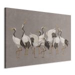 Tableau XXL - Crane dance – bright silhouettes of birds against a warm grey background with texture