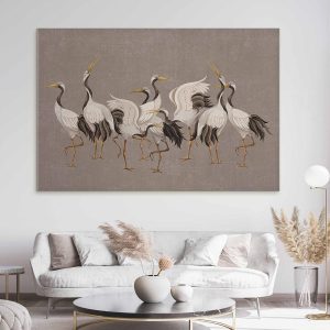 Tableau XXL - Crane dance – bright silhouettes of birds against a warm grey background with texture
