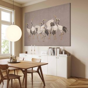 Tableau XXL - Crane dance – bright silhouettes of birds against a warm grey background with texture