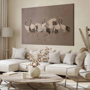 Tableau XXL - Crane dance – bright silhouettes of birds against a warm grey background with texture