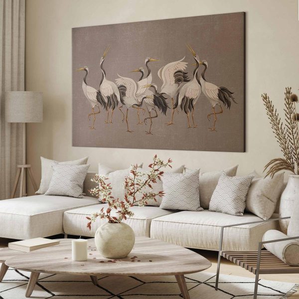 Tableau XXL - Crane dance – bright silhouettes of birds against a warm grey background with texture