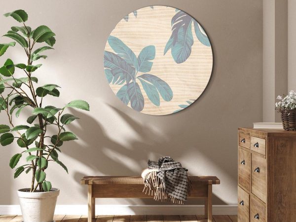 Tableau rond - Palm trees behind the mist - Showy palm leaves in a soft shade of green on a slightly wavy sand background Tableau rond - Palm trees behind the mist - Showy palm leaves in a soft shade of green on a slightly wavy sand background