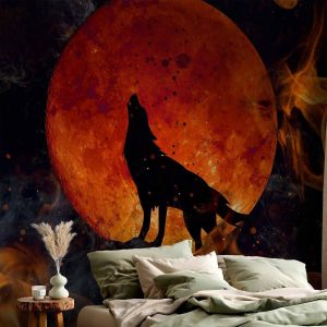 Papier peint - Wild nature - wolf on a background of a red moon in flames of fire