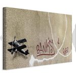 Tableau - Banksy's Plane (1-part) - Red Graffiti Text on Mural Background
