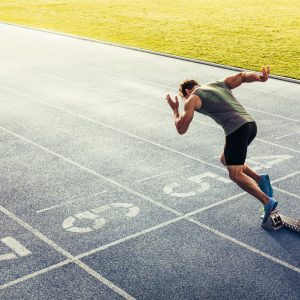 Papier Peint Sprinter Sur La Piste De Course Pendant – Image 1