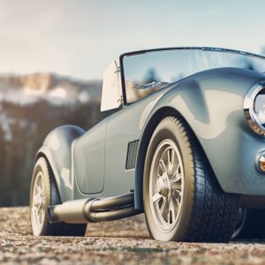 Peinture sur toile Voiture Classique Sur Fond De Montagnes – Image 1